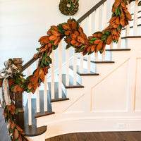 magnolia garland on staircase