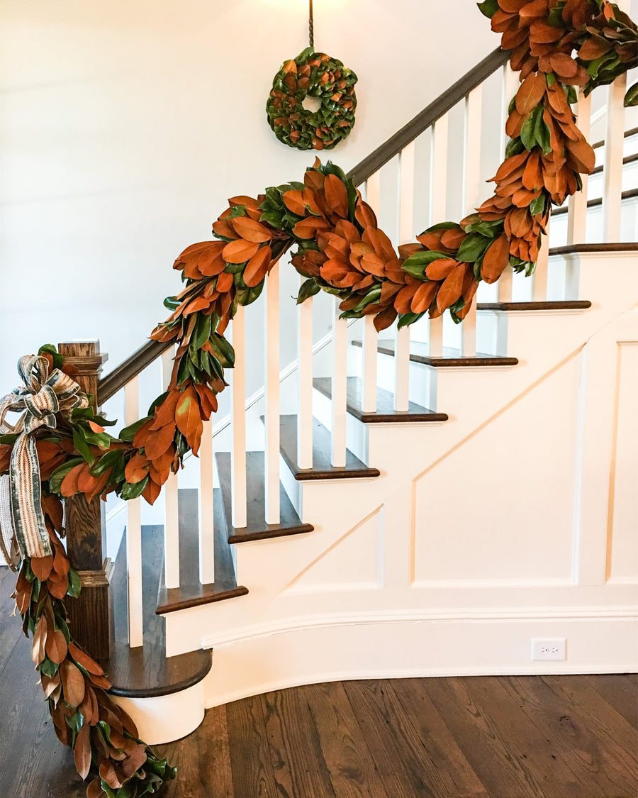 magnolia garland on staircase